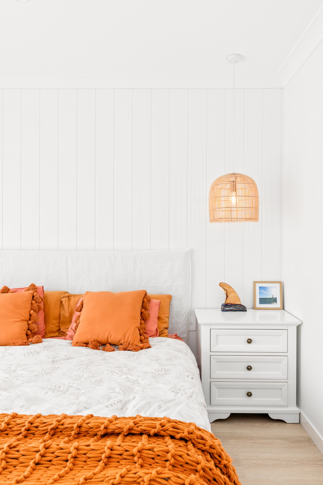 Coastal-style bedroom shot vertically for social media